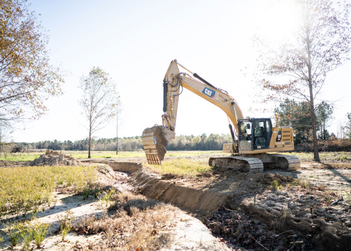 Cat Bulldozer Moving Dirt At Mining Job Site